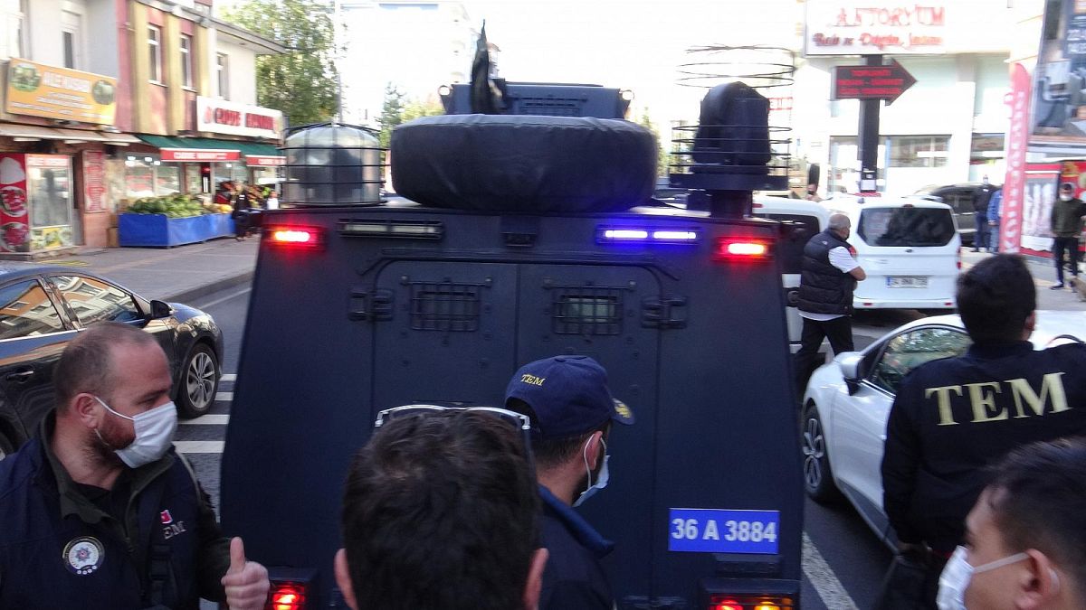 Ayhan Bilgen, the mayor of Kars, was taken away in a police van on Friday morning
