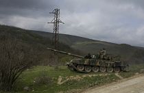 FILE PHOTO: Armenian soldiers patrol on a tank near the village of Madaghis in Nagorno-Karabakh, Azerbaijan, Wednesday, April 6, 2016.