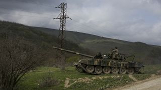 FILE PHOTO: Armenian soldiers patrol on a tank near the village of Madaghis in Nagorno-Karabakh, Azerbaijan, Wednesday, April 6, 2016.