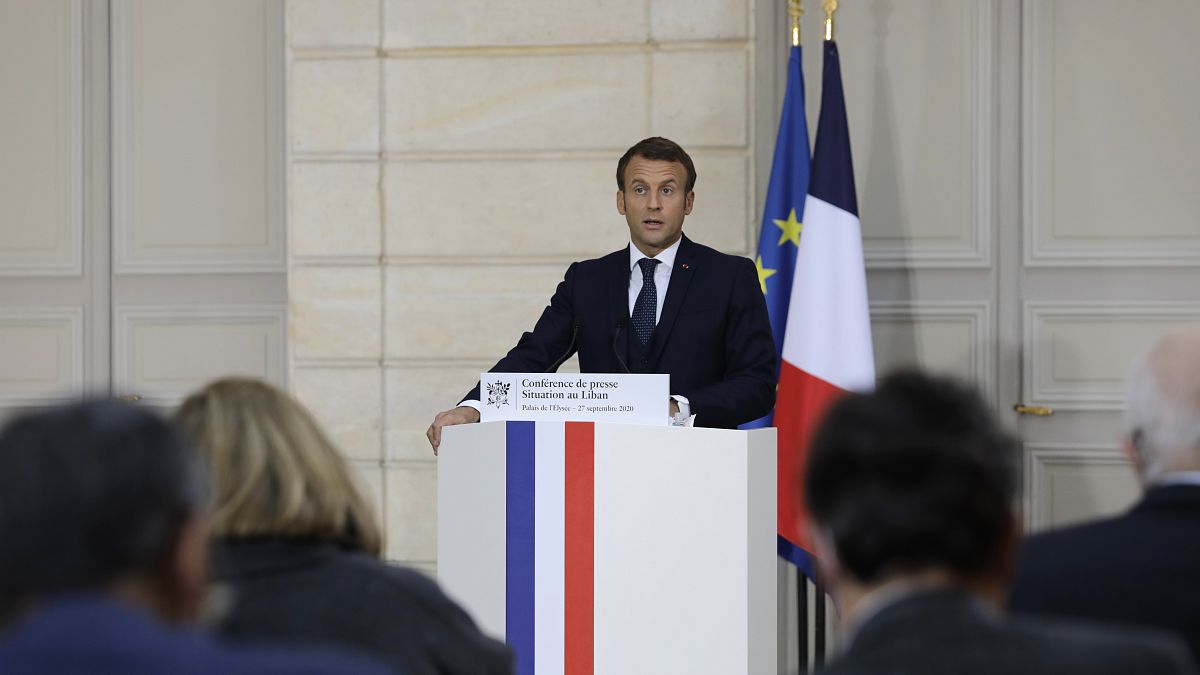 French President Emmanuel Macron speaks during a press conference on the situation in Lebanon, Sunday, Sept.27, 2020 in Paris. 