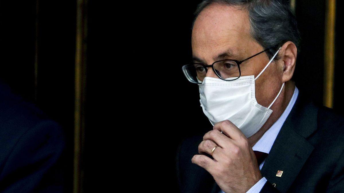 Catalan regional President Quim Torra leaves the Spanish Supreme Court in Madrid, Spain, Thursday, Sept. 17, 2020.