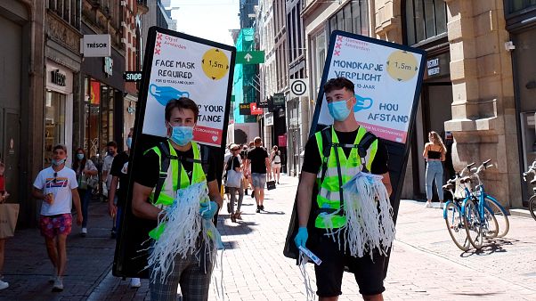 Masks are handed out to the public in Amsterdam Masks are handed out to the public in Amsterdam