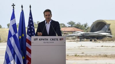 Greek Prime Minister Kyriakos Mitsotakis delivers a speech during his visit at the Naval Support Activity base at Souda