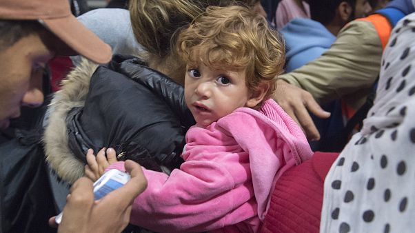FILE: Refugees arrive at the train station in Saalfeld, central Germany, Sept. 5, 2015. FILE: Refugees arrive at the train station in Saalfeld, central Germany, Sept. 5, 2015.