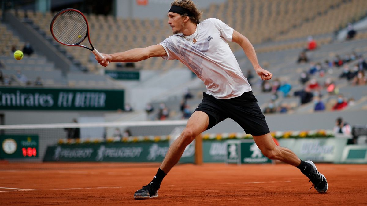 Germany's Alexander Zverev plays a shot against France's Pierre-Hugues Herbert in the second round match of the French Open in Paris, France, Sept. 30, 2020.