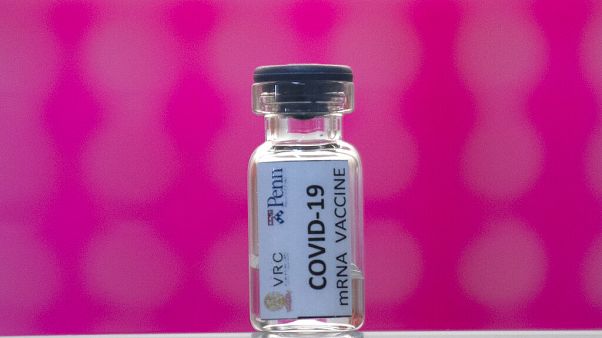 FILE - In this Monday, May 25, 2020 file photo, a vile of a COVID-19 vaccine candidate in Thailand. FILE - In this Monday, May 25, 2020 file photo, a vile of a COVID-19 vaccine candidate in Thailand.