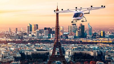 One of the aircrafts of German eVTOL Startup Volocopter flying over Paris One of the aircrafts of German eVTOL Startup Volocopter flying over Paris