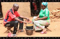 Faustin Ntiranyibagira and Leoncie Nduwimana sharing a meal at their place in Colline Kiremera, Burundi