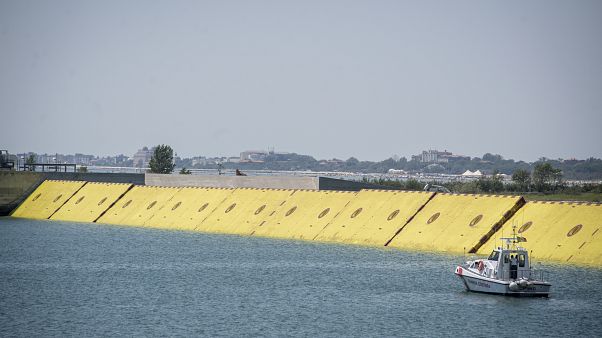 Moveable flood gates rise from the sea in the Venice lagoon, Italy, Friday, July 10, 2020. Moveable flood gates rise from the sea in the Venice lagoon, Italy, Friday, July 10, 2020.