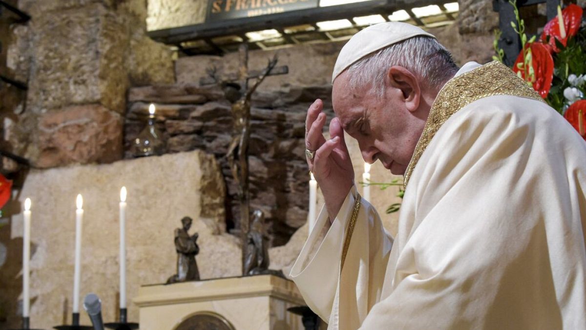 Pope Francis celebrates Mass in the crypt of the Basilica of St. Francis, in Assisi, Italy, Saturday, Oct. 3, 2020. 