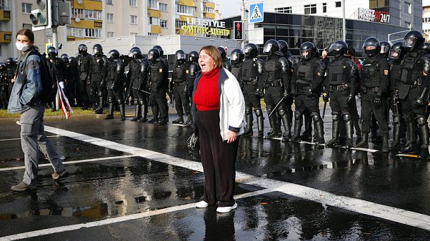A protester shouts in front of a riot police line during a rally in Minsk, Belarus, Sunday, Oct. 4, 2020. A protester shouts in front of a riot police line during a rally in Minsk, Belarus, Sunday, Oct. 4, 2020.