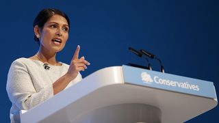  In this Tuesday, Oct. 1, 2019 file photo, Britain's Home Secretary Priti Patel addresses the delegates at the Conservative Party Conference in Manchester, England.