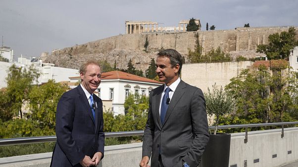 Microsoft President Brad Smith, left, speaks with Greek Prime Minister Kyriakos Mitsotakis Microsoft President Brad Smith, left, speaks with Greek Prime Minister Kyriakos Mitsotakis