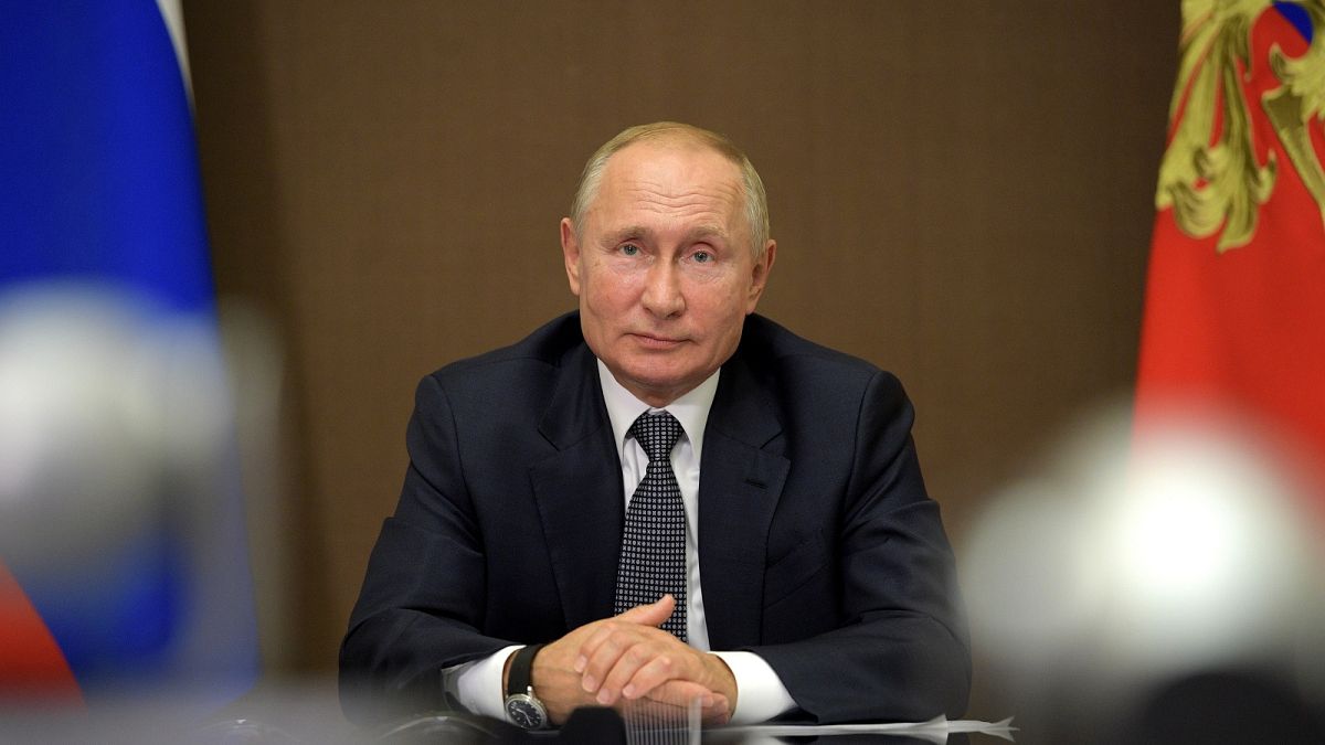 Russian President Vladimir Putin attends a meeting with Moldova's President Igor Dodon via video conference on September 28, 2020. 