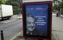 he July 5, 2017 file photo shows an anti-Soros campaign reading "99 percent reject illegal migration" and "Let's not allow Soros to have the last laugh" in Budapest, Hungary.