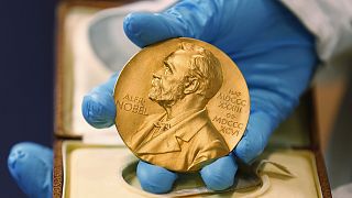 A gold Nobel Prize medal given to recipients of the prestigious award.