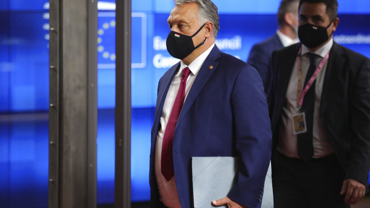 Hungary's Prime Minister Viktor Orban departs an EU summit at the European Council building in Brussels.