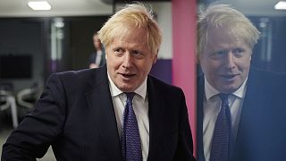 Britain's Prime Minister Boris Johnson visits the headquarters of Octopus Energy in London, Monday October 5, 2020.