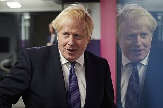 Britain's Prime Minister Boris Johnson visits the headquarters of Octopus Energy in London, Monday October 5, 2020.