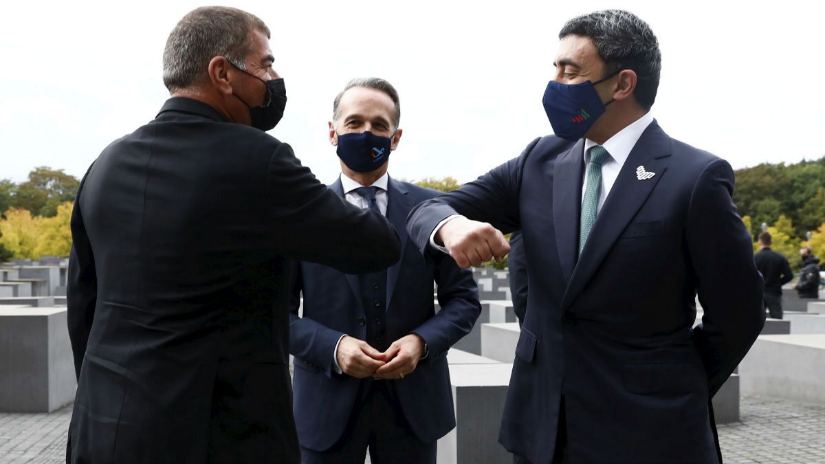 Israel Gabi Ashkenazi, left, and the United Arab Emirates Sheikh Abdullah bin Zayed Al Nahyan the Holocaust Memorial during a meeting in Berlin, Germany, Tuesday, Oct. 6, 2020