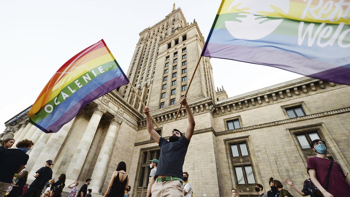 LGBT rights supporters protest in Warsaw, Poland, Saturday, August 8, 2020.