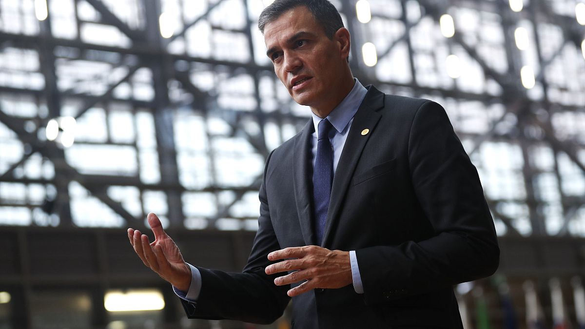 Pedro Sanchez speaks on camera as he arrives for a European Union (EU) summit at the European Council Building in Brussels on October 1, 2020. European leaders are meeting to 