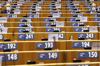 MEPs, wearing face masks to fight against the spread of the coronavirus, attend a plenary session at the European Parliament in Brussels