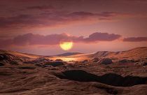 file photo - This artist's concept shows exoplanet Kepler-1649c orbiting around its host red dwarf star.