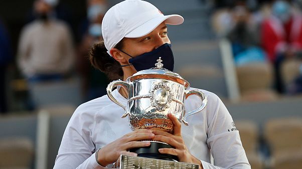 Poland's Iga Swiatek holds the trophy after winning the French Open, beating Sofia Kenin of the US 6-4, 6-1 in the final at Roland Garros, Paris, October 10, 2020. Poland's Iga Swiatek holds the trophy after winning the French Open, beating Sofia Kenin of the US 6-4, 6-1 in the final at Roland Garros, Paris, October 10, 2020.