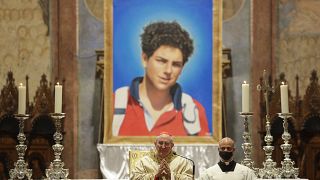 An image of 15-year-old Carlo Acutis, an Italian boy who died in 2006 of leukemia, is seen during his beatification ceremony in Assisi, Italy, October 10, 2020.