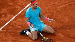 Spain's Rafael Nadal celebrates beating Serbia's Novak Djokovic in the French Open Men's Final at Roland Garros in Paris, October 11, 2020.