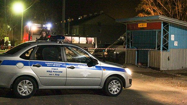 Police initially said a young man had escaped the scene in the village of Bolshiye Orly, about 400 kilometres east of Moscow. Police initially said a young man had escaped the scene in the village of Bolshiye Orly, about 400 kilometres east of Moscow.