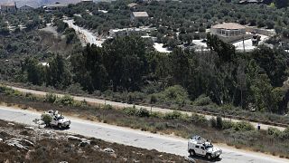 İsrail Lübnan sınırında devriye gezen BM Geçici Görev Gücü'ne (UNIFIL) bağlı askerler (arşiv)