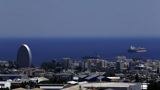 FILE - This Friday, July 6, 2018 file photo, shows the Oval building, left, one of a number of new high-rises transforming the skyline view in Limassol, Cyprus.