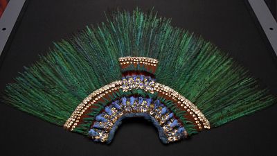 The plume of feathers linked to the legendary Aztec ruler Moctezuma on display at the Museum of Ethnology in Vienna, Austria