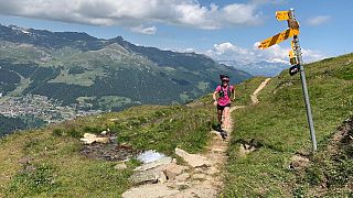 Running along mountain trails in Valais in the Swiss Alps