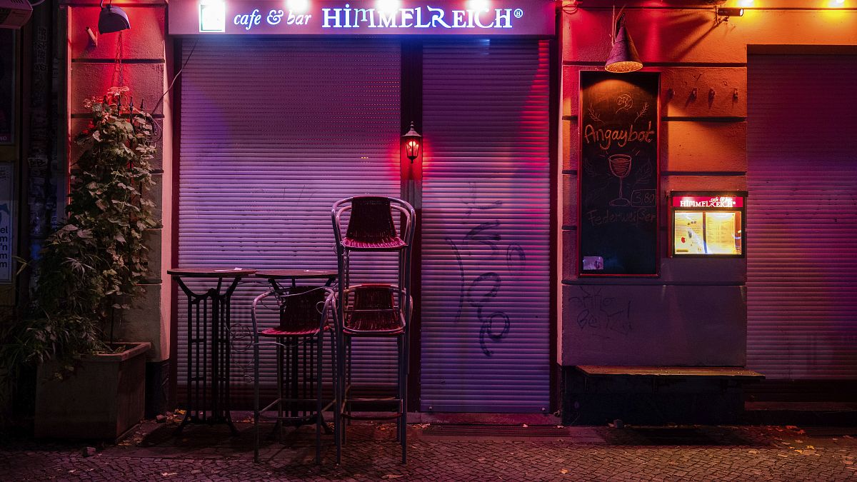 The 'Himmelreich' (kingdom of heaven) bar is closed in the Friedrichshain district in Berlin, Germany, late Wednesday, Oct. 14, 2020