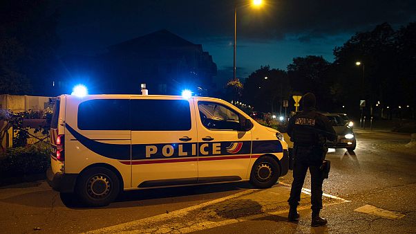 French police officers stand guard a street in Eragny on October 16, 2020 French police officers stand guard a street in Eragny on October 16, 2020