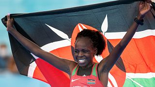 Peres Jepchirchir of Kenya celebrates after beating the World Record at the 2020 IAAF World Half Marathon Championships in Gdynia, Poland. October 17, 2020.