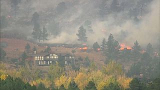 The flames have destroyed homes and forced owners to leave