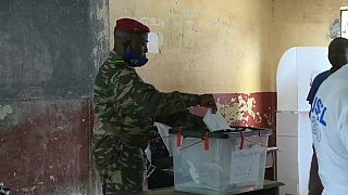 Guineans vote in high-stakes presidential election as Conde seeks third term