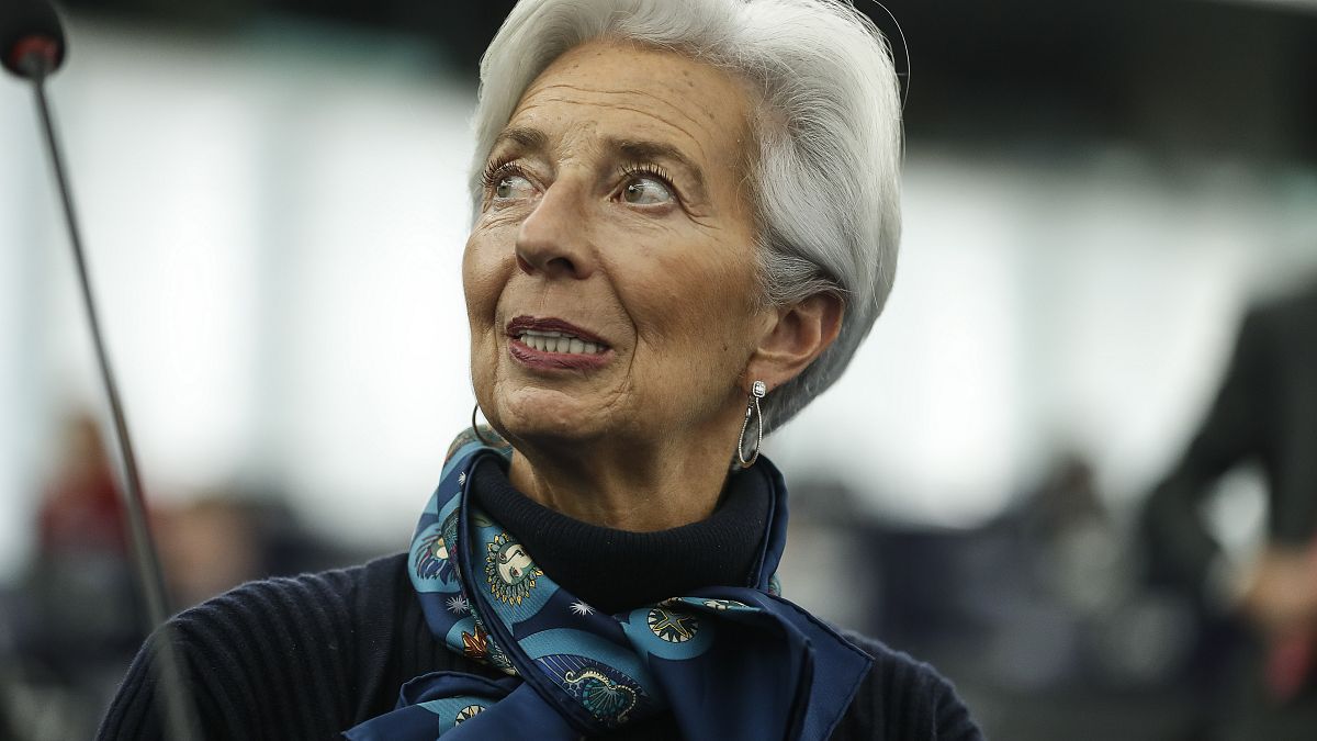 In this Tuesday Feb. 11, 2020 file photo, Christine Lagarde president of the ECB looks up prior to deliver her speech before the European Parliament's economic and monetary af