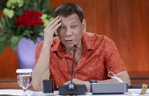In this photo provided by the Malacanang Presidential Photographers Division, Philippine President Rodrigo Duterte attends a meeting at the Malacanang presidential palace.