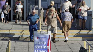 Voters leave the Polk County Gov. Center after casting their ballots Monday, Oct. 19, 2020, in Lakeland, Fla. Chris O'Meara/Copyright 2020 The Associated Press. 