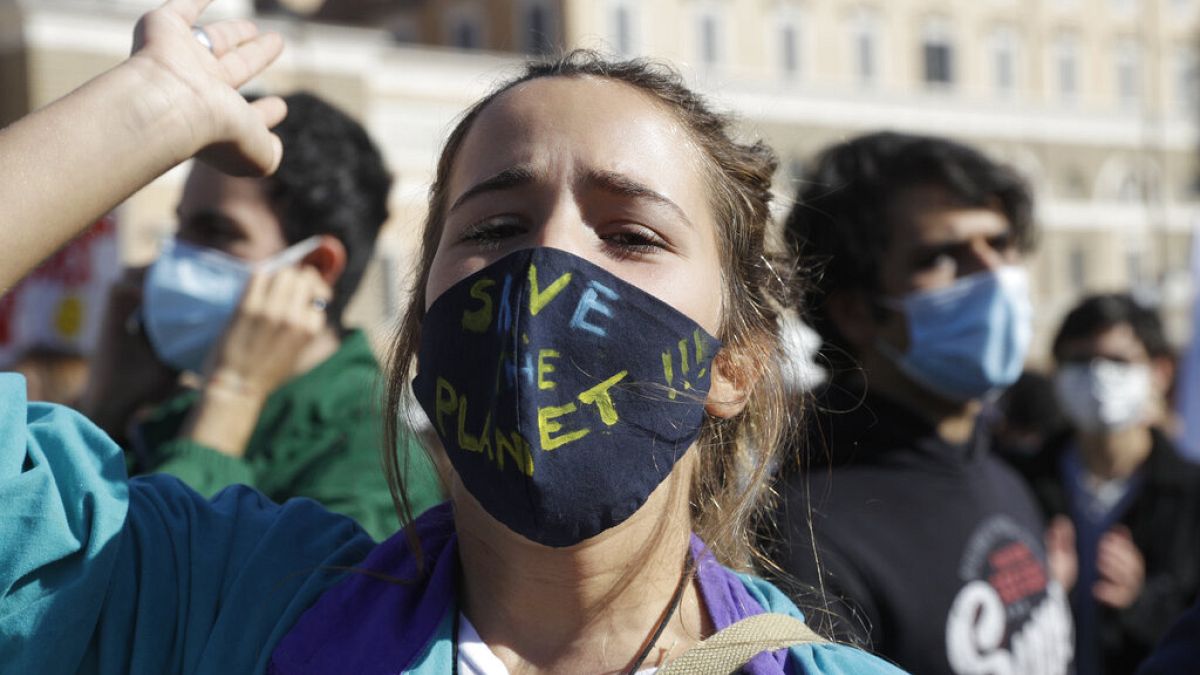Students attend a "Fridays For Future" protest rally in Rome, Friday, Oct. 9, 2020