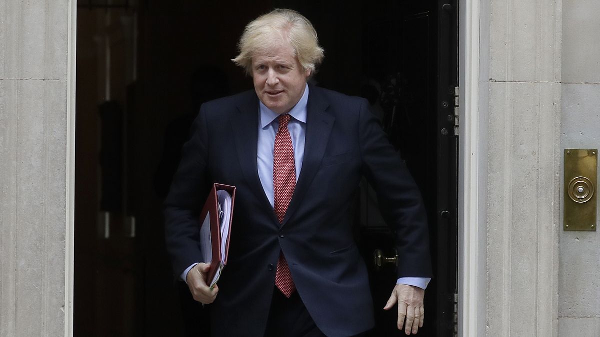 Britain's Prime Minister Boris Johnson leaves 10 Downing Street to attend the weekly session of PMQs in Parliament in London, Wednesday, June 10, 2020.