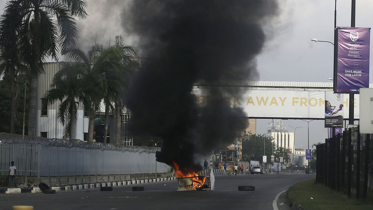 After 13 days of protests against alleged police brutality, authorities have imposed a 24-hour curfew in Lagos.
