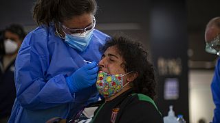 A woman gets a rapid antigen test for COVID-19 in the southern neighbourhood of Vallecas in Madrid, Spain