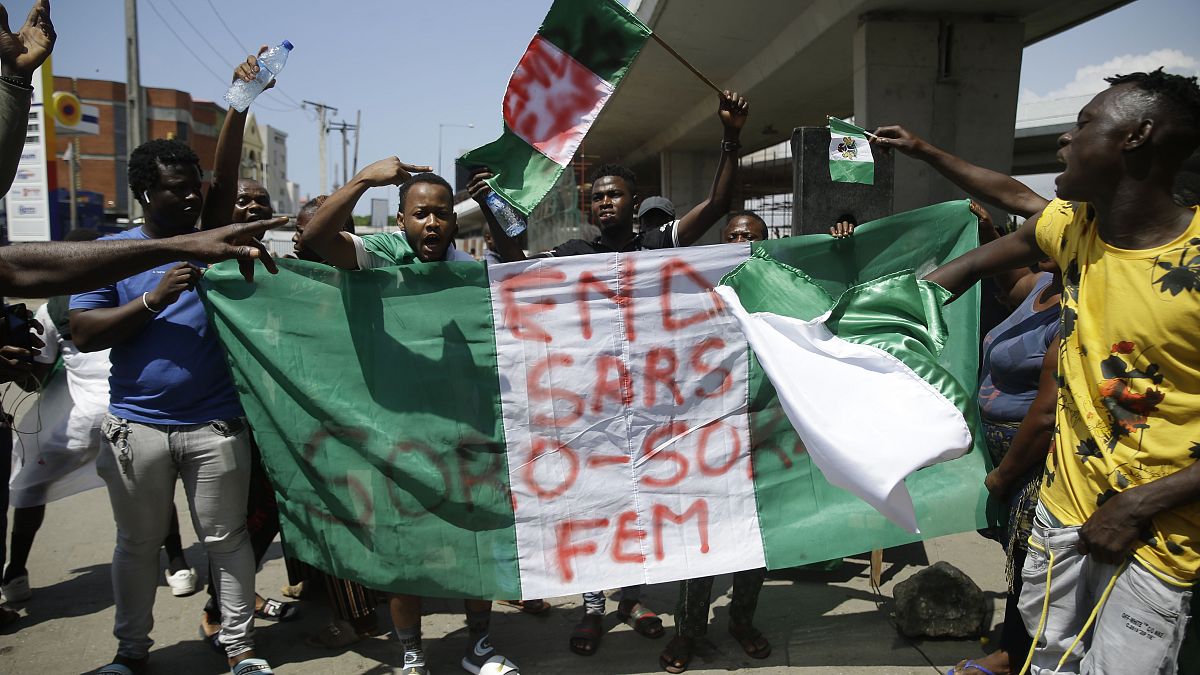 Protestors demonstrate on the streets of Lagos on Tuesday.