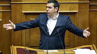 President of left-wing Syriza party Alexis Tsipras speaks during a parliament session
